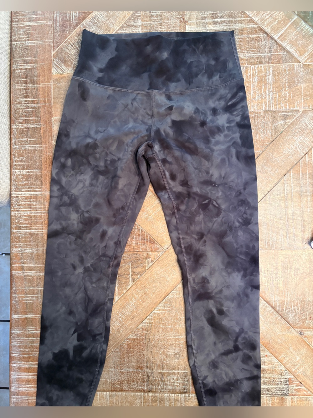 Lululemon high-rise leggings in a black and charcoal gray tie-dye print. Size 10